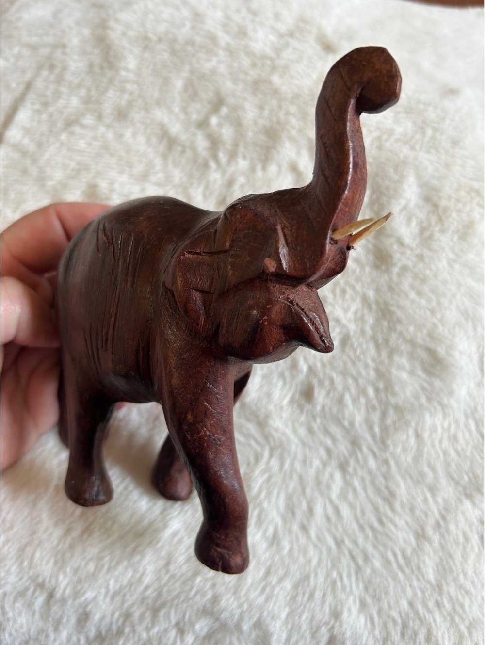 Hand-Carved Wooden Elephant Figurine with Raised Trunk